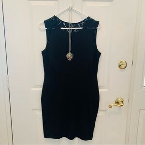 Black sleeveless dress with lace back